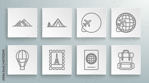 Set line Hot air balloon, Tourist tent with wood fire, Postal stamp and Eiffel tower, Passport biometric data, Hiking backpack, Globe flying plane, and Egypt pyramids icon. Vector