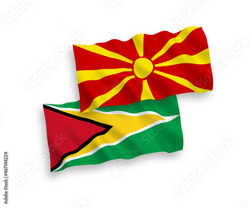 Flags of Co-operative Republic of Guyana and North Macedonia on a white background