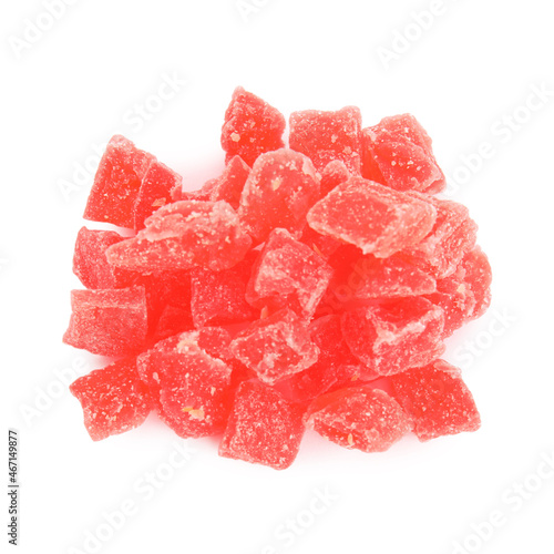 Delicious red candied fruit pieces on white background, top view