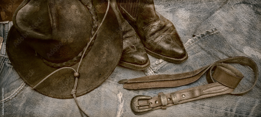 photo vintage, jean, chapeau, bottines et ceinture de cuir - obrazy, fototapety, plakaty 