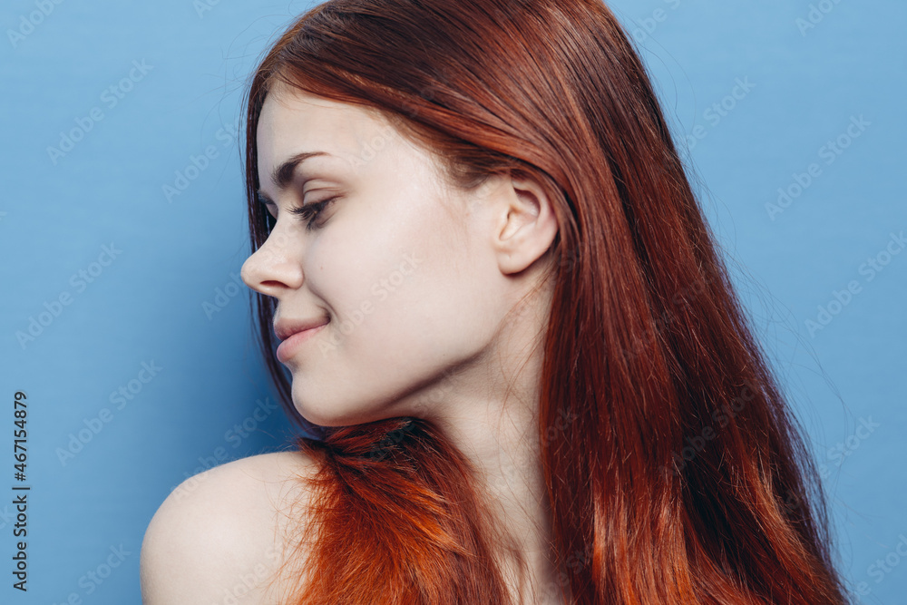 Fototapeta premium red-haired woman attractive look close-up bare shoulders