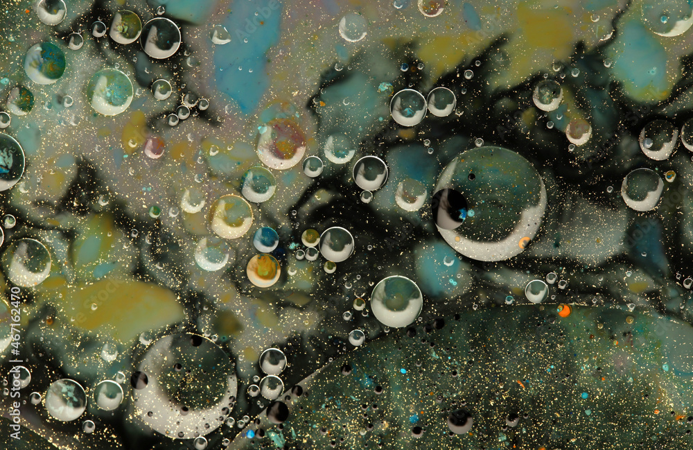 Abstract blot wave and bubble horizontal background. Marble texture. Acrylic gold and black color in water and oil.
