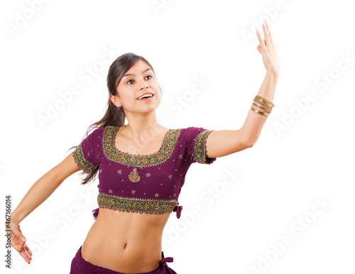 Beautiful indian young brunette dancing