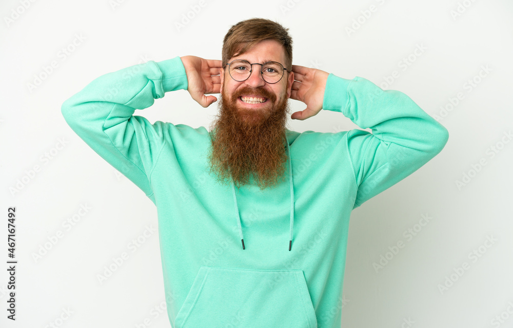 Young reddish caucasian man isolated on white background laughing Young reddish caucasian man isolated on white background laughing