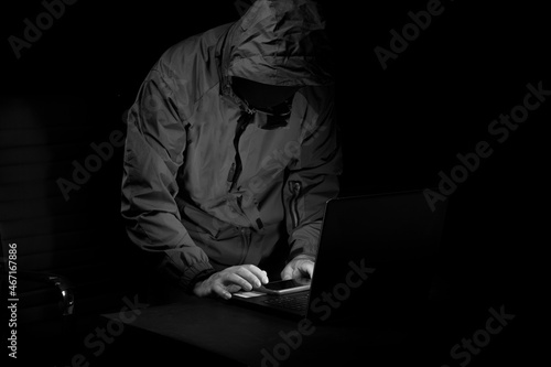 concept of hacking and malware Hackers use abstract laptops to steal Internet data