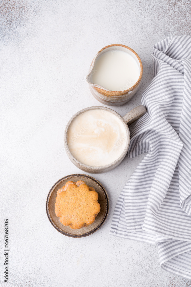 Cup of coffee and homemade cookies, light breakfast or snack, winter hot drinks Cup of coffee and homemade cookies, light breakfast or snack, winter hot drinks