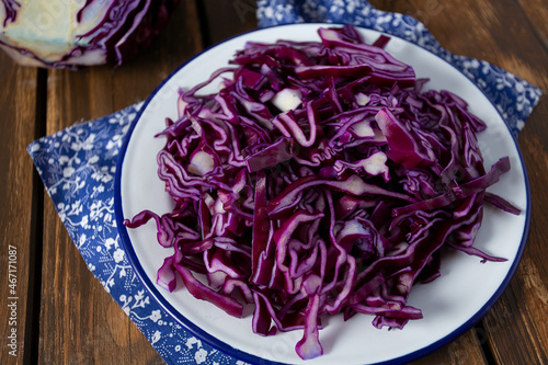 red cabbage on brown wooden surface