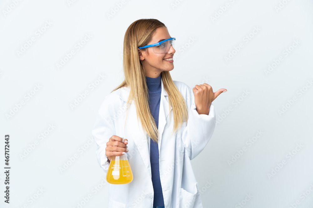 Young scientific woman isolated on white background pointing to the side to present a product Young scientific woman isolated on white background pointing to the side to present a product
