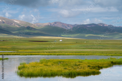 Pasture at 3000m above sea level not far from a small lake in the highlands there is a yurt, this is how the nomadic way of life in Kyrgyzstan looks like.