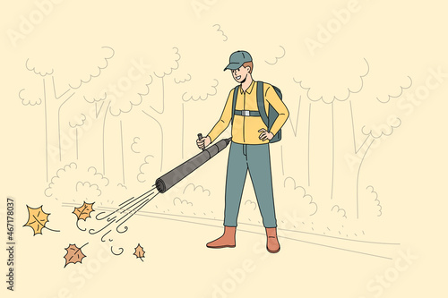 Cleaning park from fallen leaves concept. Young smiling man worker cartoon character in uniform standing and cleaning vacuuming fallen leaves in park vector illustration 
