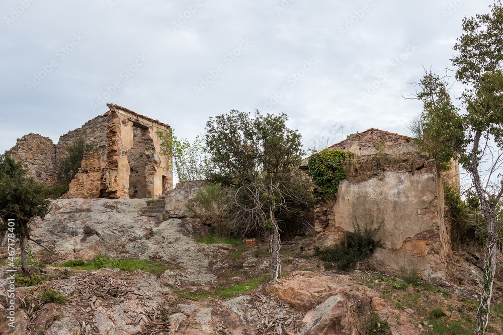 ruins of houses on rocky hill
