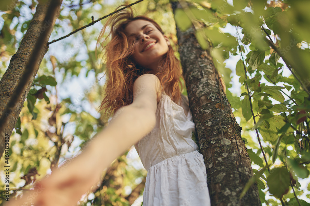 joyful woman in white dress near tree nature summer joyful woman in white dress near tree nature summer