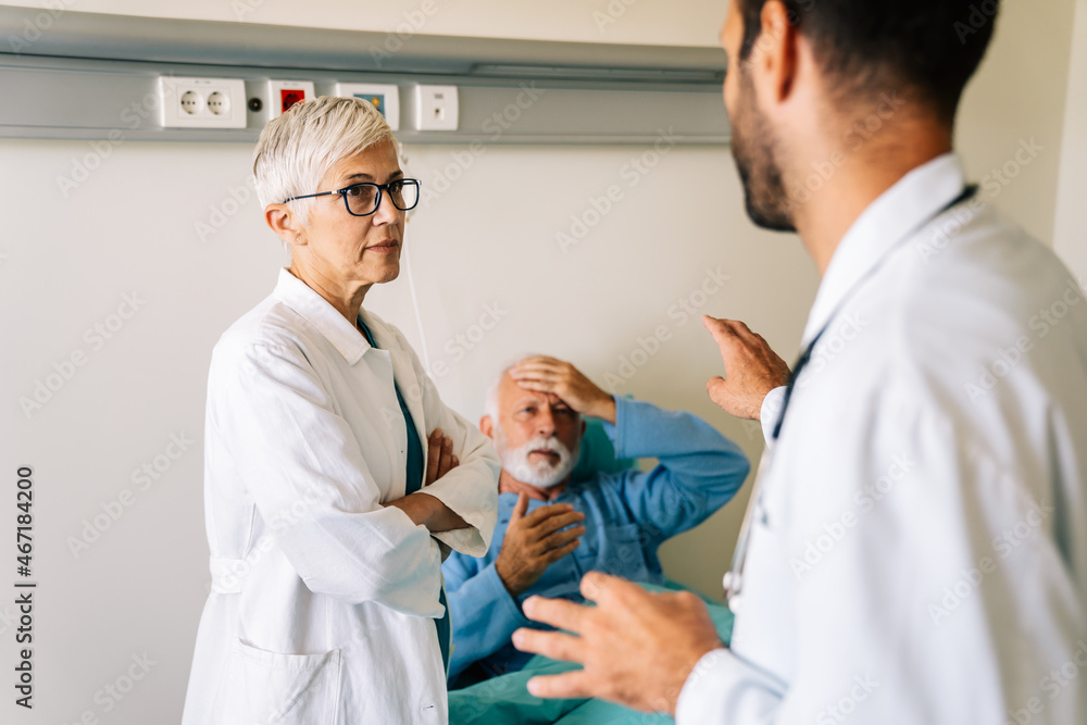 Doctor discusses the diagnosis with the worried senior man patient. Healthcare concept Doctor discusses the diagnosis with the worried senior man patient. Healthcare concept
