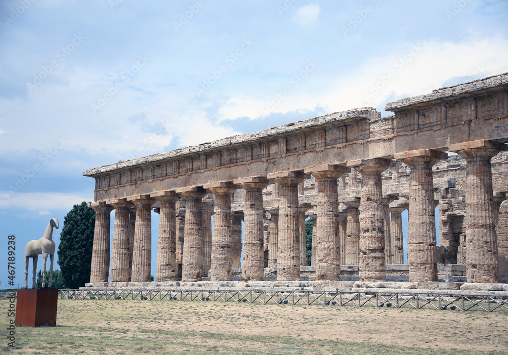 Fototapeta premium Side view of the columns of the Temple of Neptune, excavations of Paestum, Cilento, Campania, Italy