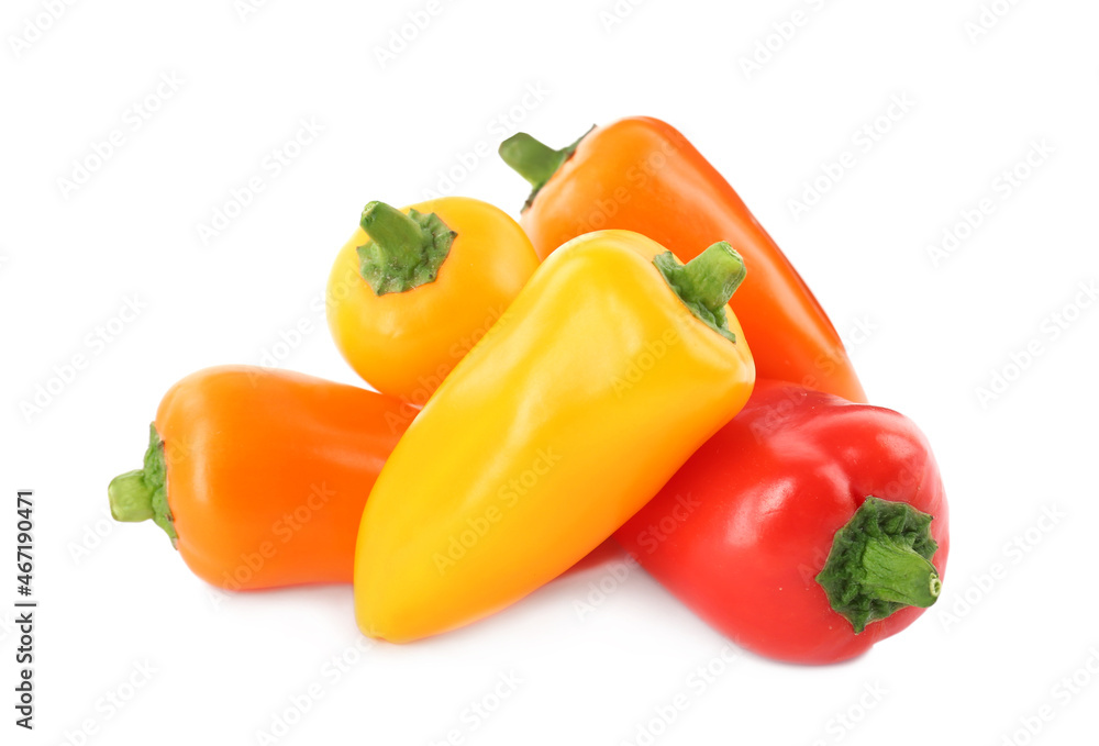 Heap of ripe bell peppers isolated on white