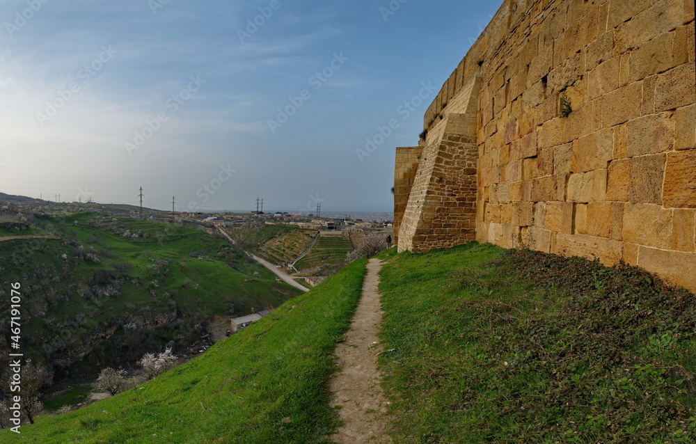 Derbent. Russia. April 09, 2021. Republic of Dagestan. The external architecture of the walls of the ancient pre-Arab fortress 
