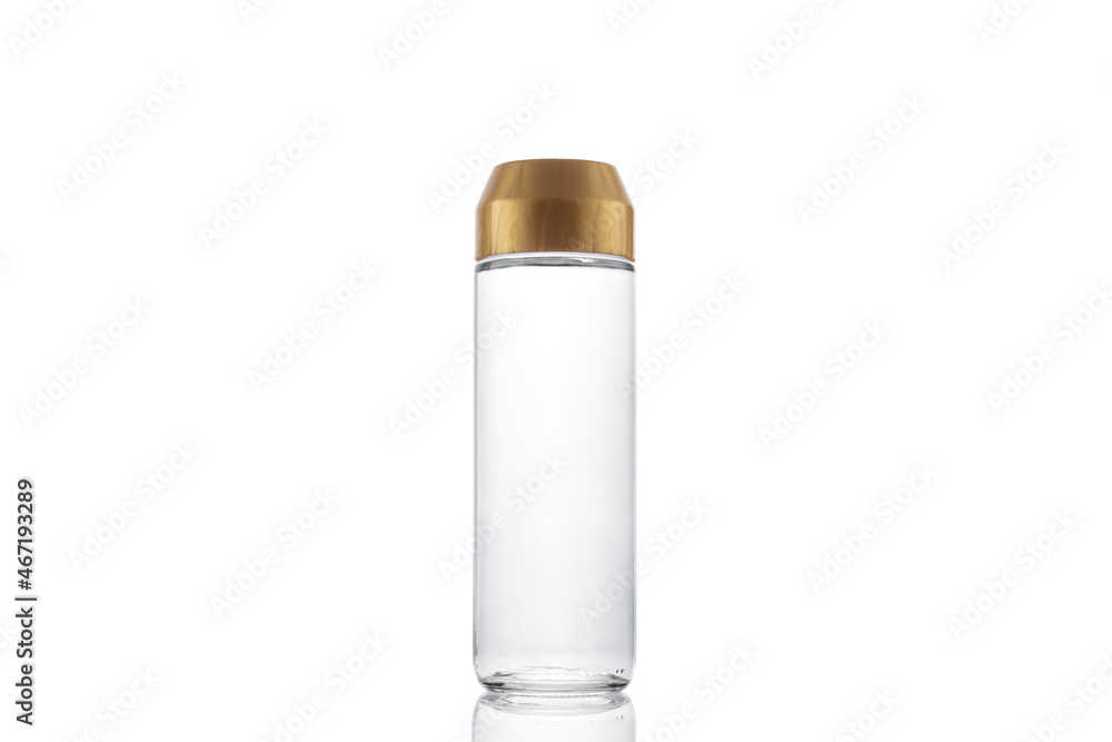 Glass bottle with water isolated on white. Glass bottle with water isolated on white.