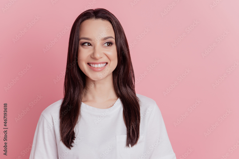 Photo of young lovely lady good mood wondered look empty space idea think isolated over pink color background Photo of young lovely lady good mood wondered look empty space idea think isolated over pink color background