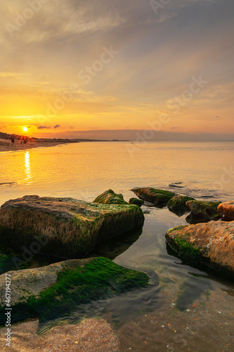 Coast of the Caspian Sea at sunset. © alexmu