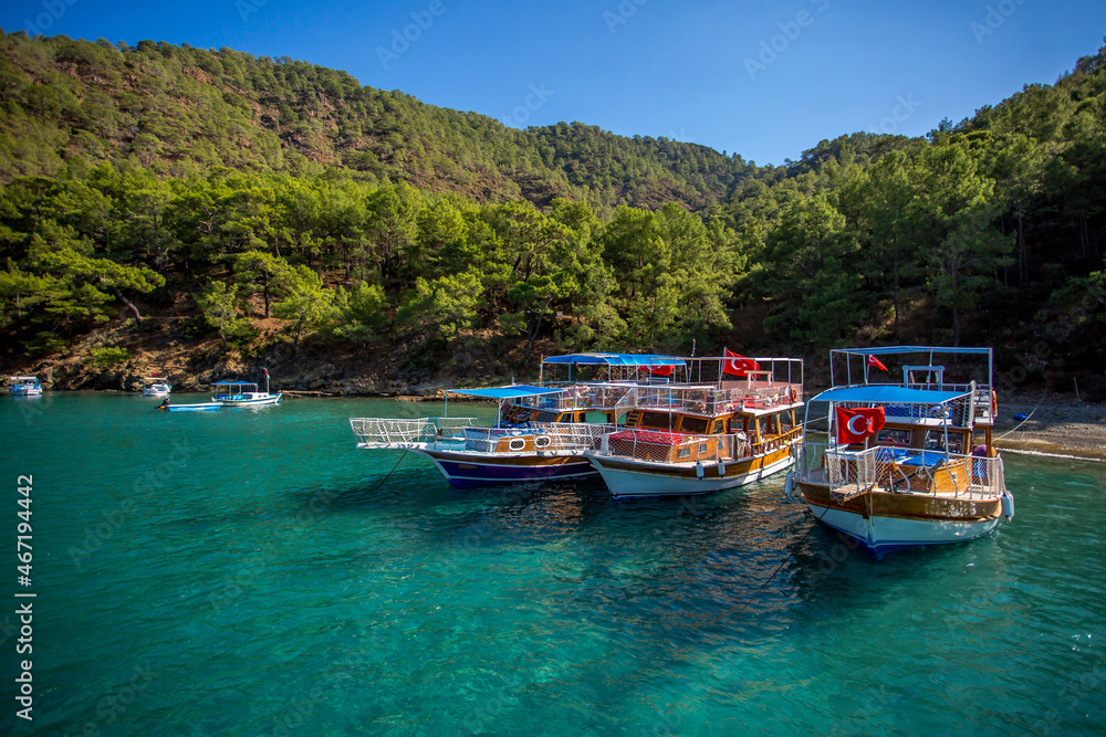 Sea trip to the Turkish island of Suluada with white sand and emerald water. A delightful place to relax and sunbathe.