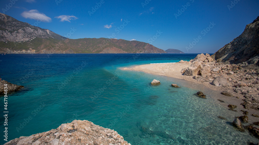 Sea trip to the Turkish island of Suluada with white sand and emerald water. A delightful place to relax and sunbathe.