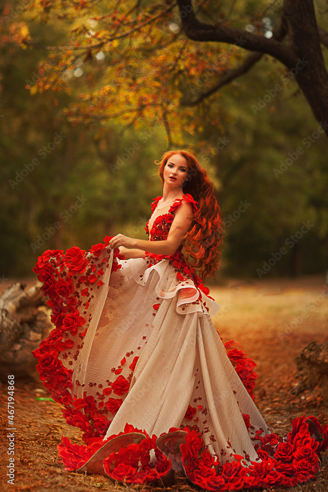 Beautiful girl with red hair in autumn park Beautiful girl with red hair in autumn park