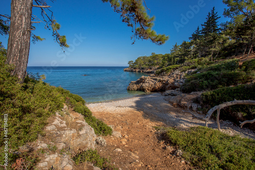 Travel in Turkey along the Lycian trail along the sea to the ancient city of Phaselis. The indescribable beauty of the small bays of the Mediterranean Sea.