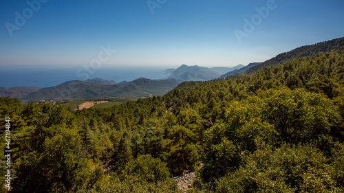 Jeep trip in the mountains of Turkey along the Lycian trail. Magnificent views from the height. Pine forest and rocks. Sea view from the top. © Elena