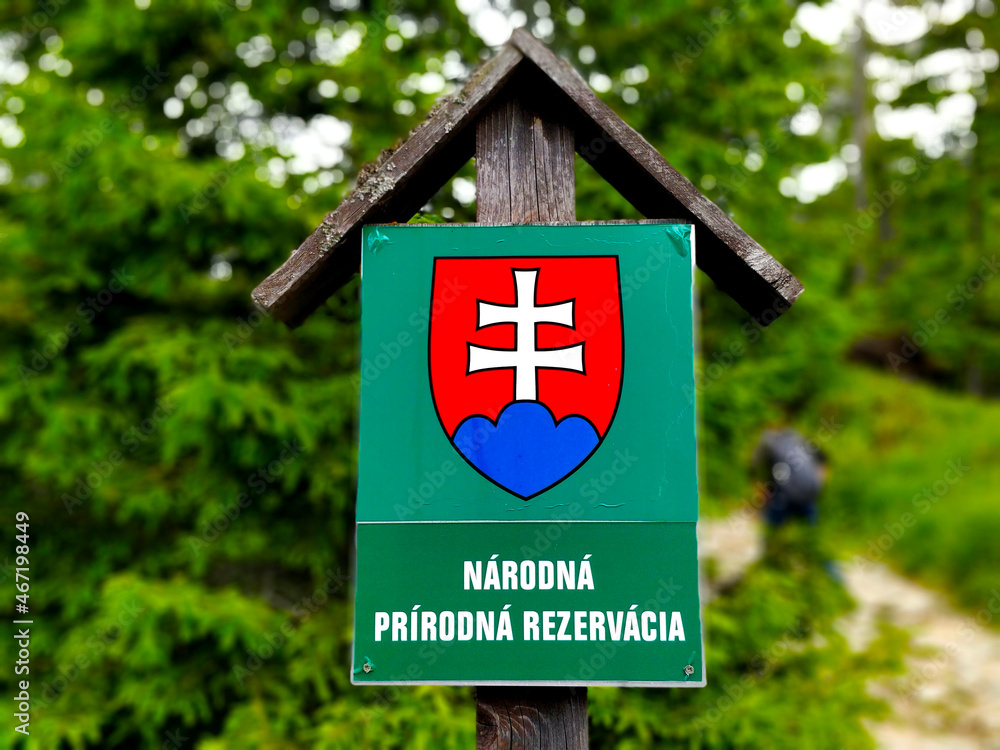 Close-up view and sign of Slovakian national natural park. It says Close-up view and sign of Slovakian national natural park. It says