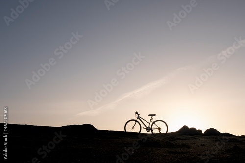 bike ride on the beach at sunrise