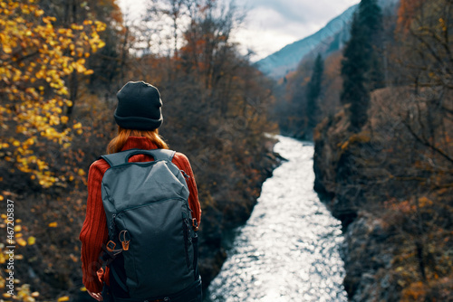 woman tourist backpack river mountains autumn © SHOTPRIME STUDIO