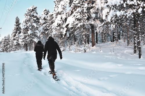 person walking in snowshoe 