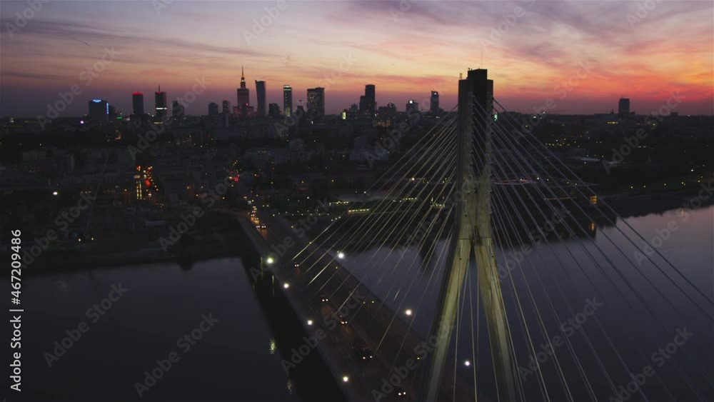 Sunset cityscape with bridge construction. Warsaw seen from above Sunset cityscape with bridge construction. Warsaw seen from above