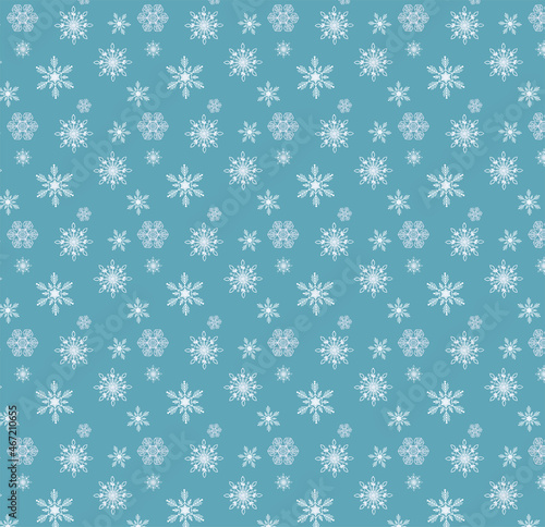 Winter vector background with a pattern of various snowflakes on a blue background