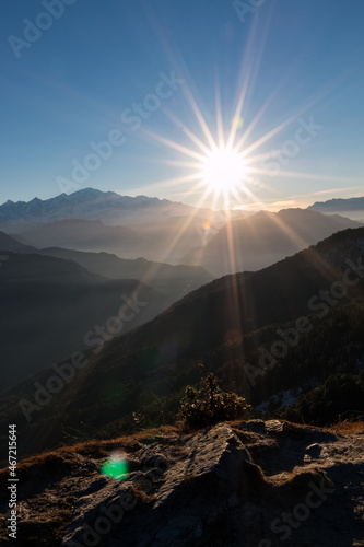 Mountain range under sun rays in Chopta, Uttarakhand, India photo