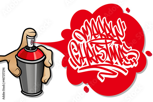 Hand holding an aerosol spraying a graffiti Merry Christmas text banner