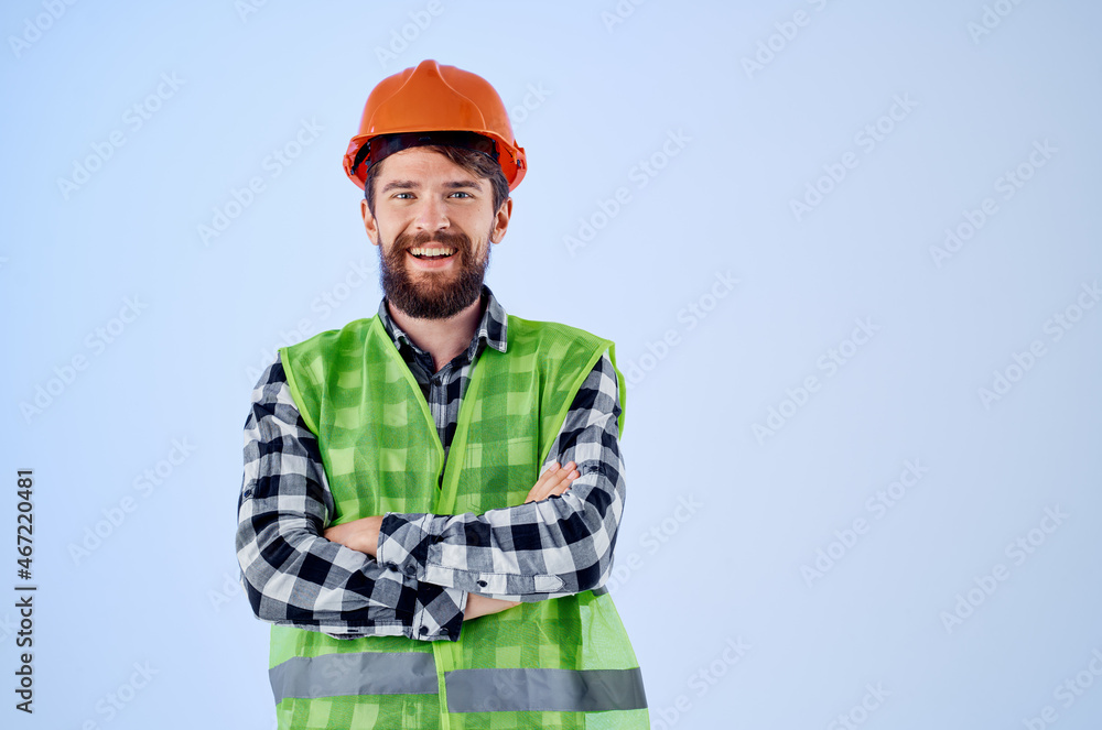 working man in orange hard hat construction professional isolated background