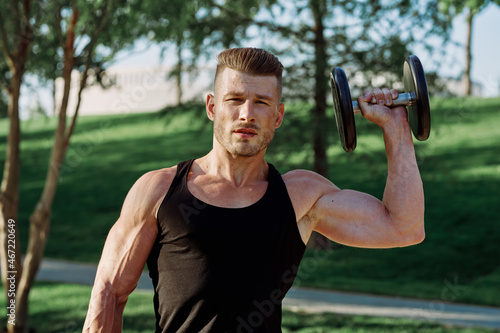pumped up sports Vykhino in the park with dumbbell workout