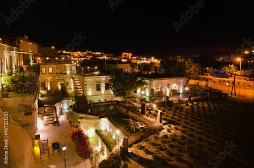 Picturesque night lights landscape of cave hotel in Goreme. Famous touristic place and travel destination inTurkey. Famous center of balloon fligths