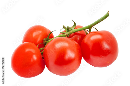 red fresh tomatoes on a green branch with leaves on a white background for your menu design or advertising brochure © Sensey3242