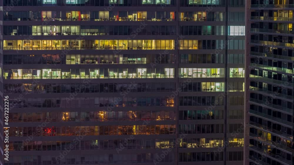Windows of office buildings night to day timelapse, the light from the windows of houses Windows of office buildings night to day timelapse, the light from the windows of houses