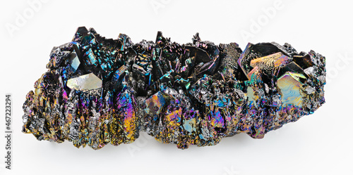 Synthetic silicon carbide with iridescent crystals of rough surface on white background. Carborundum chemical compound. In nature rare as moissanite mineral. Use as abrasive or semiconductor material. photo