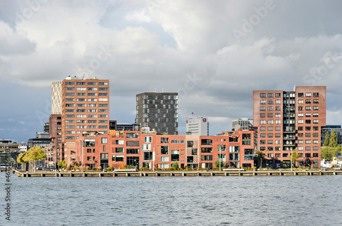 Rotterdam, The Netherlands, November 4, 2021: former industrial zone on Mullerpier converted to residential neighbourhood with low and medium high brick buildings
