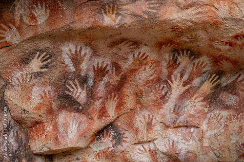 Prehistoric hand paintings at the Cave of the Hands (Spanish: Cueva de Las Manos ) in Santa Cruz Province, Patagonia, Argentina. The art in the cave dates from 13,000 to 9,000 years ago. photo