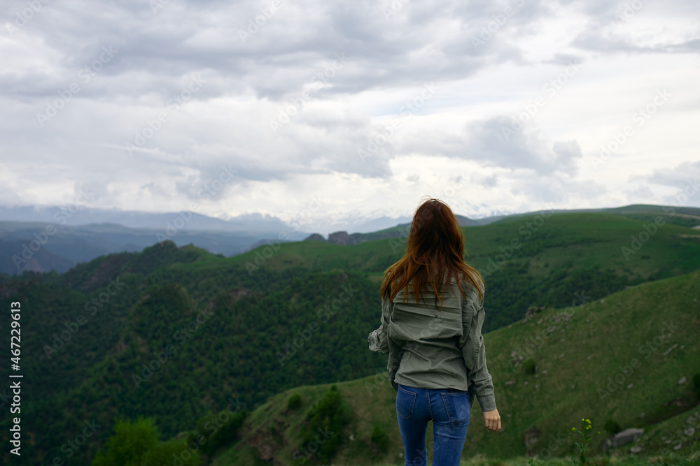 Naklejka premium woman hiker mountains travel landscape adventure nature