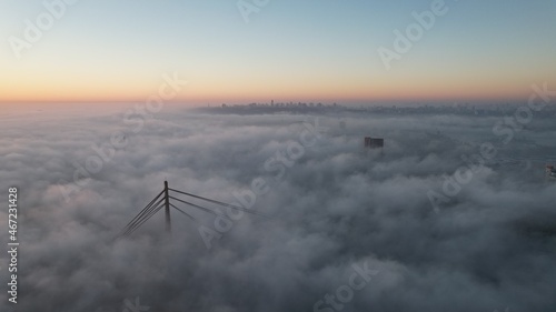 Bridge in the fog on the sunrise 
