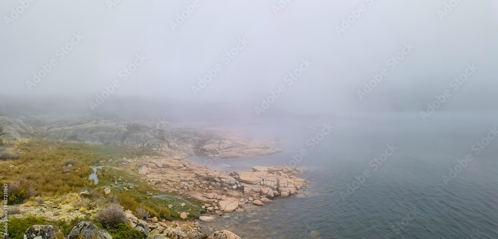Idyllic landscape of a lagoon in a foggy environment