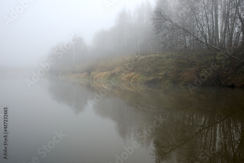 the Russian landscape - the river and the wood in the fall