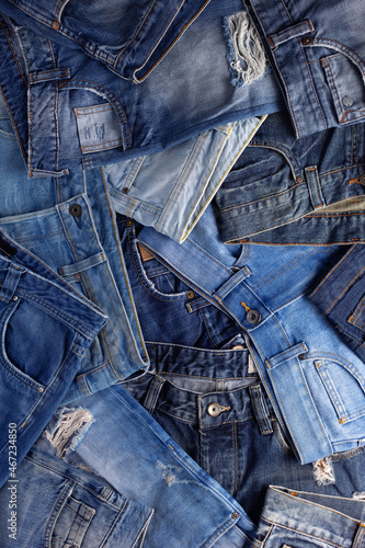 Fototapet Stack of blue jeans denim