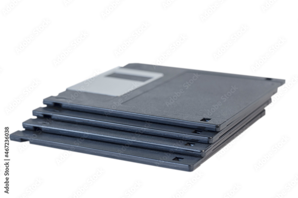 four floppy disks stacked on top of each other isolated on white four floppy disks stacked on top of each other isolated on white